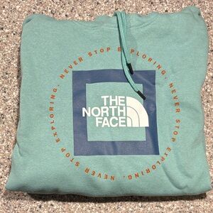 The North Face Seafoam Green Hoodie with Navy & Orange Logo